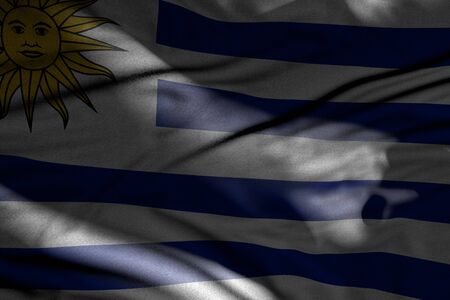 beautiful independence day flag 3d illustration - photo of dark Uruguay flag with folds lying in...