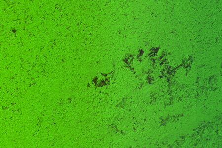 beautiful aged green travertine like plaster texture for use as background.