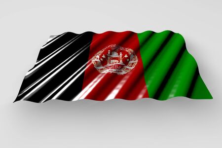 beautiful shining flag of Afghanistan with large folds lay isolated on grey - any occasion flag 3d illustrationの写真素材