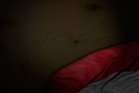 cute dark illustration of Hungary flag with big folds on dark wood with free space for your content - any holiday flag 3d illustrationの写真素材