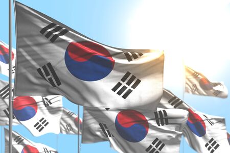 nice any occasion flag 3d illustration
 - many Republic of Korea (South Korea) flags are waving against blue sky photo with selective focusの写真素材