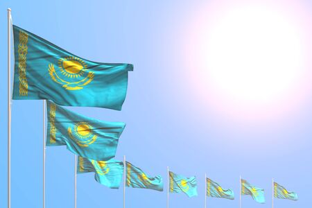 nice many Kazakhstan flags placed diagonal on blue sky with space for text - any holiday flag 3d illustrationの写真素材