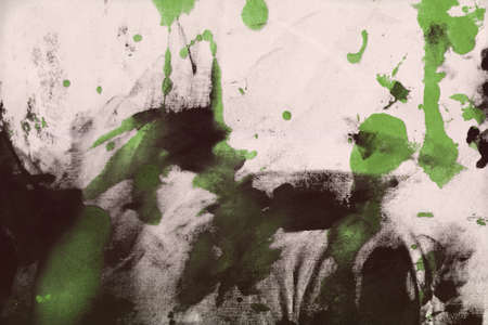 beautiful aged randomly painted canvas, fabric with color paint spots and blots texture for use as background.の写真素材