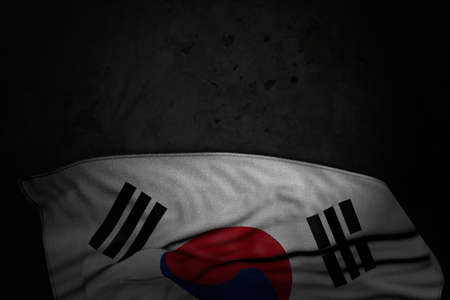 pretty any occasion flag 3d illustration - dark image of Republic of Korea (South Korea) flag with big folds on black stone with free space for contentの写真素材