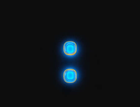 Blue and yellow shiny neon light glow transparent reflective alphabet - colon isolated on dark, 3D...