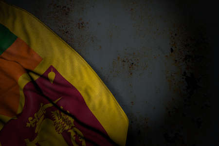 nice dark picture of Sri Lanka flag with big folds on rusty metal with free place for text - any holiday flag 3d illustrationの写真素材