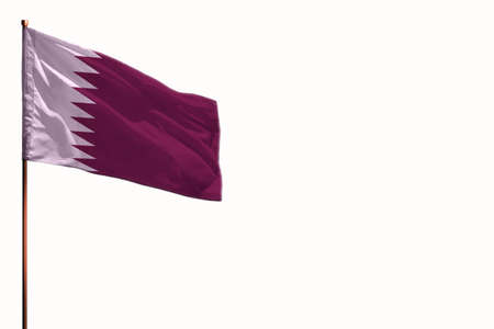 Fluttering Qatar flag isolated, mockup with the place for your text on white background.の写真素材
