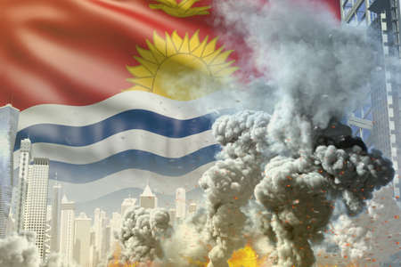 big smoke column with fire in the modern city - concept of industrial catastrophe or act of terror on Kiribati flag background, industrial 3D illustrationの写真素材