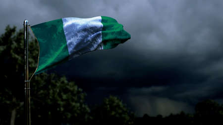 Nigeria flag for independence day on dark storm cumulus clouds - abstract 3D illustrationの写真素材