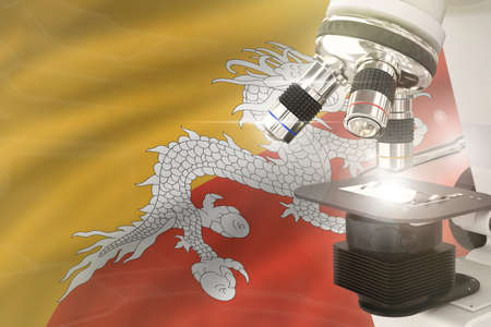 Bhutan science development concept - microscope on flag background. Research in genetics or...