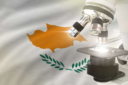 Cyprus science development concept - microscope on flag background. Research in pharmacy or physics 3D illustration of objectの写真素材