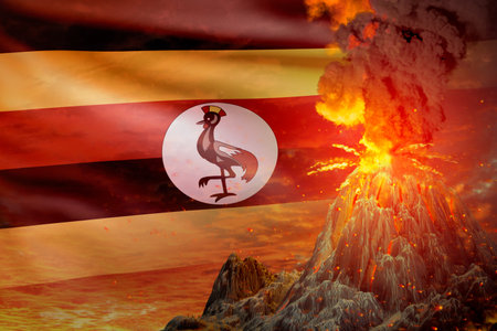 conical volcano eruption at night with explosion on Uganda flag background, problems of natural disaster and volcanic earthquake concept - 3D illustration of natureの写真素材