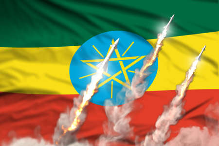 Modern strategic rocket forces concept on flag fabric background, Ethiopia nuclear missile attack - military industrial 3D illustration, nuke with flagの写真素材