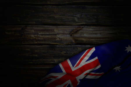 cute any feast flag 3d illustration - dark picture of Australia flag with big folds on old wood with free space for textの写真素材