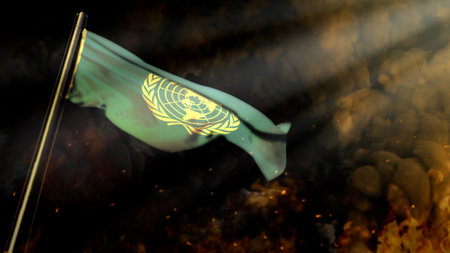 defocused United Nations (UN) flag on smoke with sun beams background - problems concept - abstract 3D illustrationの写真素材