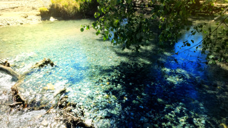 small clear cold river with pebble rocks in Arkhyz mountain ridge - photo of natureの写真素材