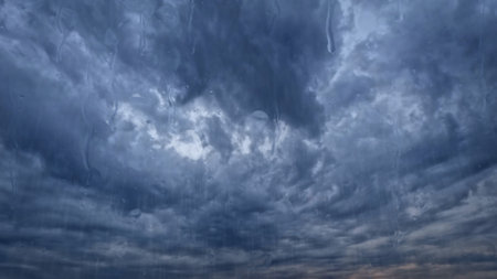 heavy rain on sky with clouds - pretty weather background - photo of natureの写真素材