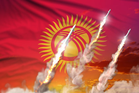 Kyrgyzstan ballistic missile launch - modern strategic nuclear rocket weapons concept on sunset background, military industrial 3D illustration with flagの写真素材