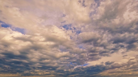 nice sunset gold clouds on the sky backdrop - photo of natureの写真素材
