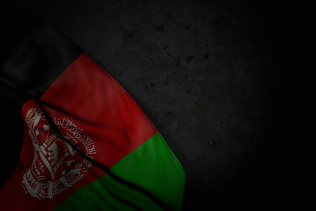 beautiful dark image of Afghanistan flag with large folds on black stone with free space for your text - any feast flag 3d illustrationの写真素材