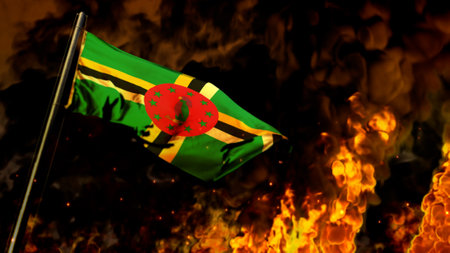 flag of Dominica on burning fire bg - hard times concept - abstract 3D renderingの写真素材