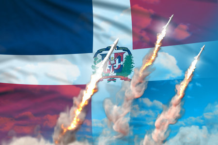 Dominican Republic nuclear warhead launch - modern strategic nuclear rocket weapons concept on blue sky background, military industrial 3D illustration with flagの写真素材