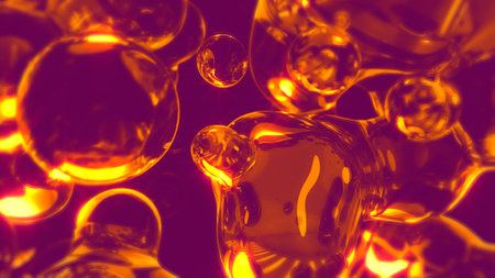 golden transparent crystalline spheres floating on pink backdrop - abstract 3D renderingの写真素材