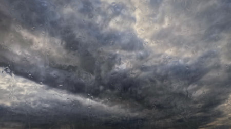 heavy rain on sky with clouds - nice weather bg - photo of natureの写真素材