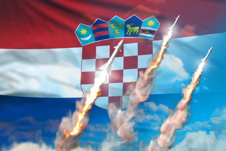 Croatia supersonic warhead launch - modern strategic nuclear rocket weapons concept on blue sky background, military industrial 3D illustration with flagの写真素材