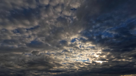 nice cloudscape of sky with heavy rain or snow clouds bg - photo of nature