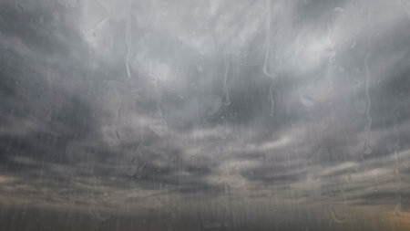 cloudburst on sky with clouds - nice weather bg - photo of natureの写真素材