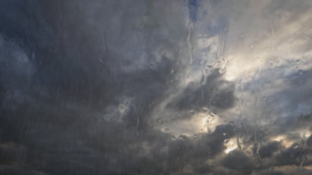 rainfall on sky with clouds - pretty weather backdrop - photo of nature