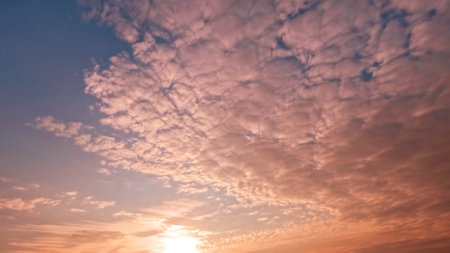 cute sundown golden clouds on the sky background - photo of natureの写真素材