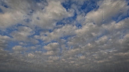 cloudburst on sky with clouds - cute weather background - photo of natureの写真素材