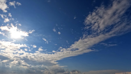 nice large white clouds in the blue sky bg - photo of natureの写真素材