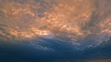 cute sunset gold clouds on the sky backdrop - photo of natureの写真素材