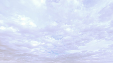 pretty large bright clouds in the blue sky backdrop - photo of natureの写真素材