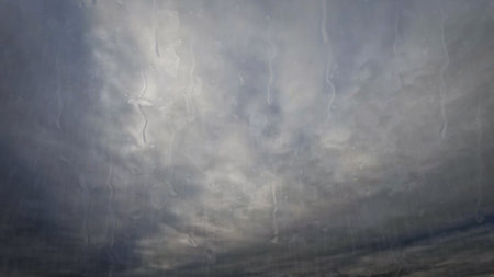 heavy rain on sky with clouds - pretty weather backdrop - photo of natureの写真素材