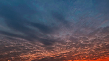 nice sundown goldish clouds on the sky backdrop - photo of nature