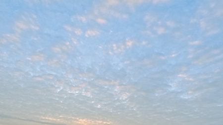 nice sundown goldish clouds on the sky backdrop - photo of natureの写真素材