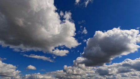 pretty huge white clouds in the blue sky bg - photo of natureの写真素材