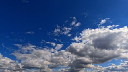 pretty huge white clouds in the blue sky background - photo of natureの写真素材