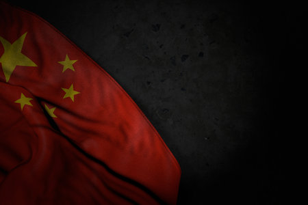 beautiful national holiday flag 3d illustration - dark picture of China flag with big folds on black stone with empty space for your textの写真素材