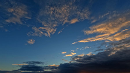 pretty sundown golden clouds on the sky bg - photo of natureの写真素材
