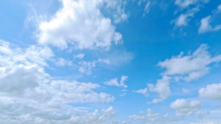 huge bright clouds in the blue sky background - photo of natureの写真素材