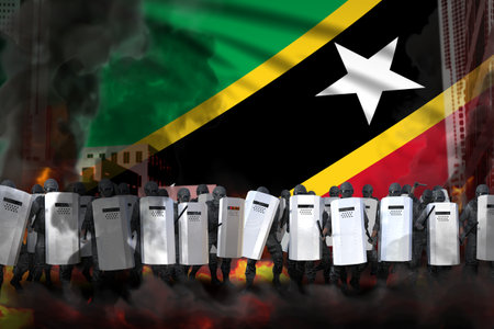 Saint Kitts and Nevis protest stopping concept, police squad on city street are protecting government against riot - military 3D Illustration on flag backgroundの写真素材