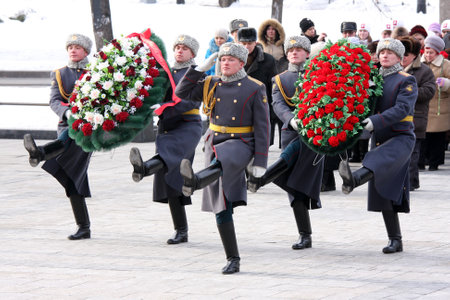 rossiya.moskva.23fevralya 2011g.vozlozhenie wreaths delegations of administrative districts of the capital on the grave of the Unknown Soldier in alevsandrovskm garden.のeditorial素材