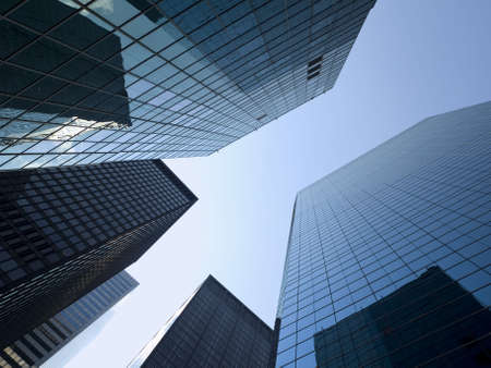 High modern skyscraper on a background of a bright sky.