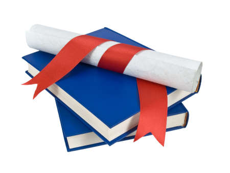 A diploma with red ribbon over blue books. Isolated on white.の写真素材