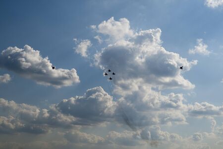 ZHUKOVSKY, RUSSIA - AUGUST 19  MiG-29 jets from Strizhi aerobatic display team break up the formation during MAKS-2011 airshow on August 19, 2011 in Zhukovsky, Russiaのeditorial素材